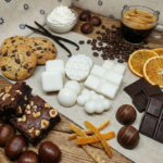 Bodegón de wax melts de cera de soja natural blanca con formas variadas de mini gofres, nubes, esferas y tabletas de chocolate para quemador.