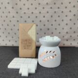 Tableta aromática de cera tipo snap bar partida en onzas. Textura realista de chocolate para derretir en quemador.